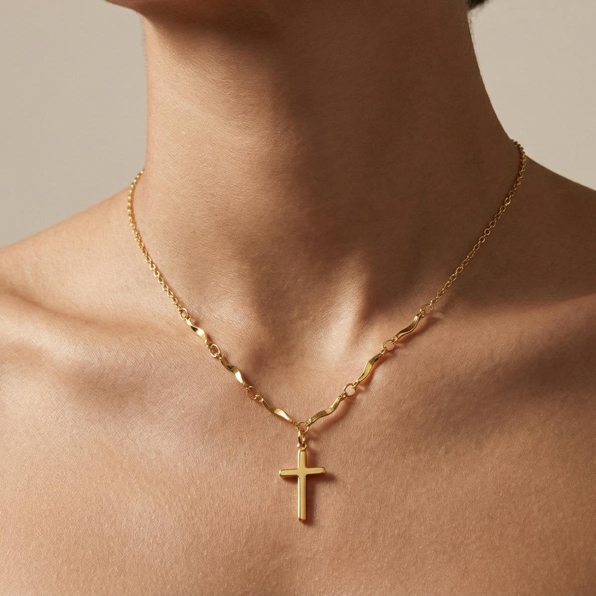 Gold Cross Necklace with Wavy Links