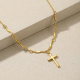 Gold Cross Necklace with Wavy Links