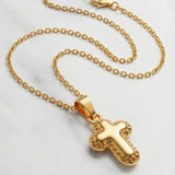Gold Cross Necklace with Rounded Shapes