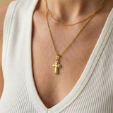 Gold Cross Necklace with Rounded Shapes
