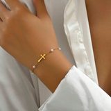 Gold Cross & Elegant Pearls Bracelet