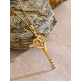 Gold Intertwined Heart Cross Necklace