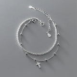 Celestial Shine Cross Bracelet