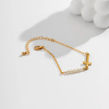Gold Bracelet with Cross and Beads