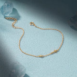 Cross Bracelet with Precious Stone